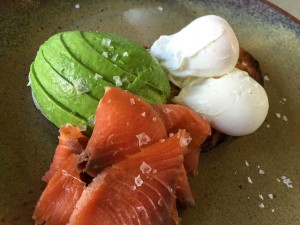 Poached eggs on toast with smoked salmon and avocado 